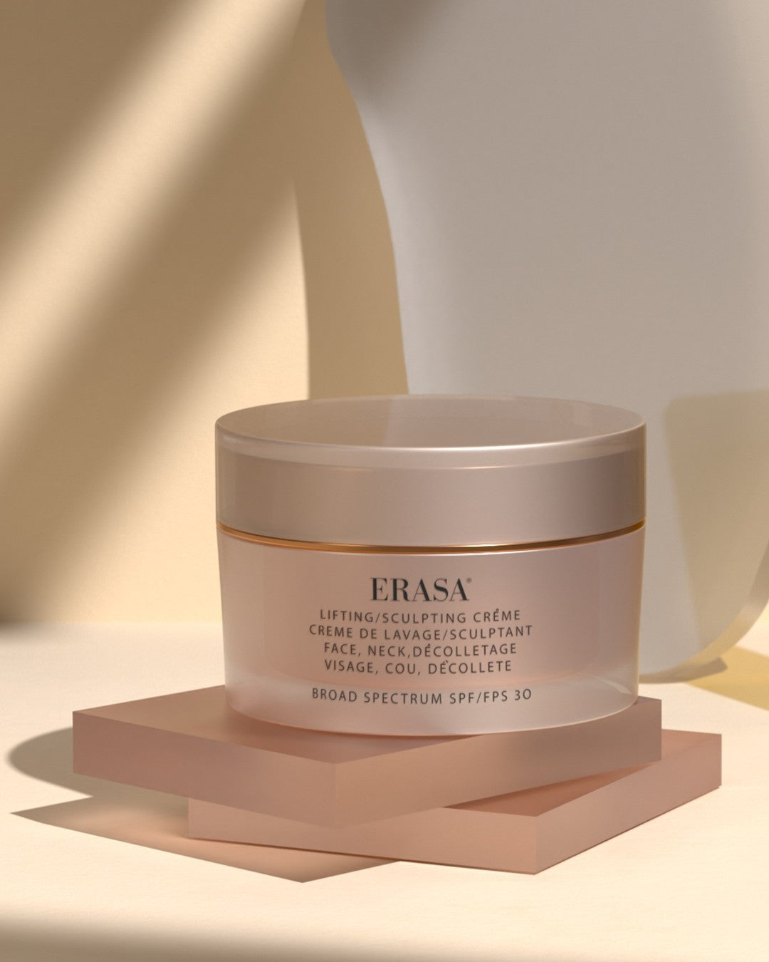 The Erasa SPF-30 Lifting/Sculpting créme. The packaging is translucent soft pink and sleek jar.