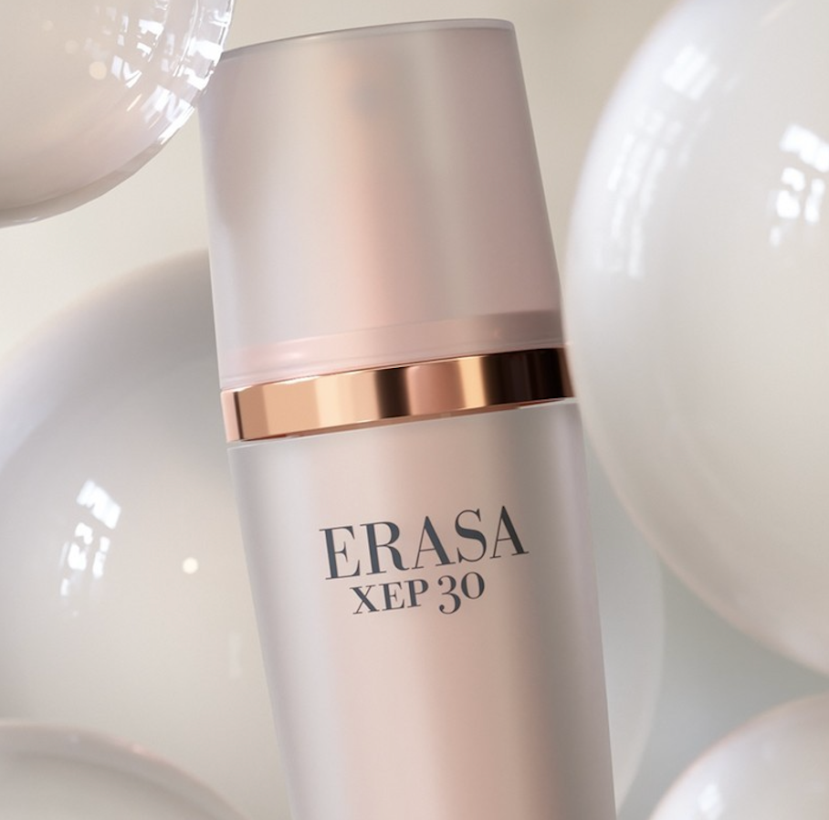 The Erasa XEP 30 Serum, the bottle is a blush and soft metallic pink shade. The front of the bottle says "Erasa XEP 30"